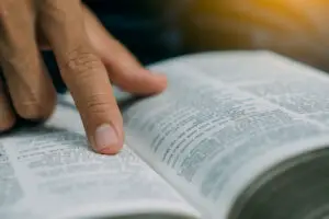 person reading Bible overlap with Christianity and Science